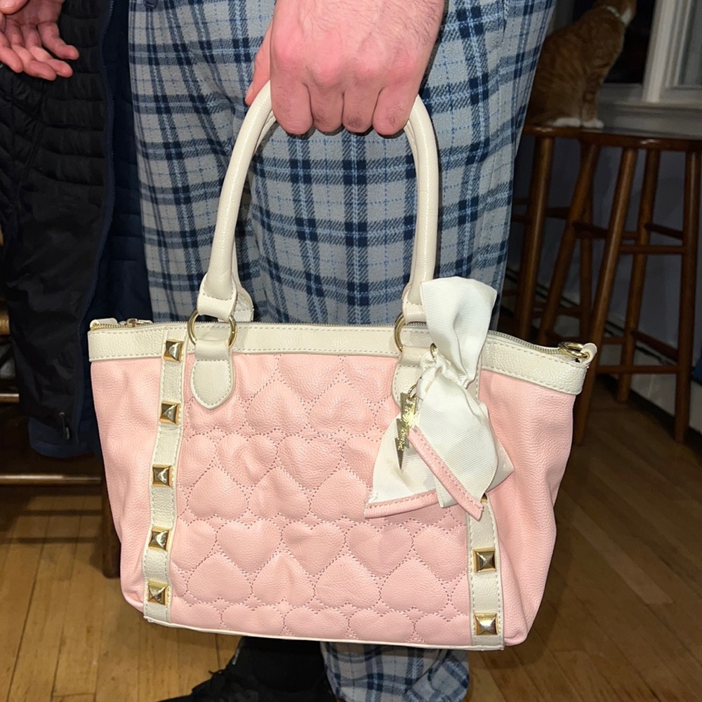 Pink Betsy Johnson purse with heart stitching